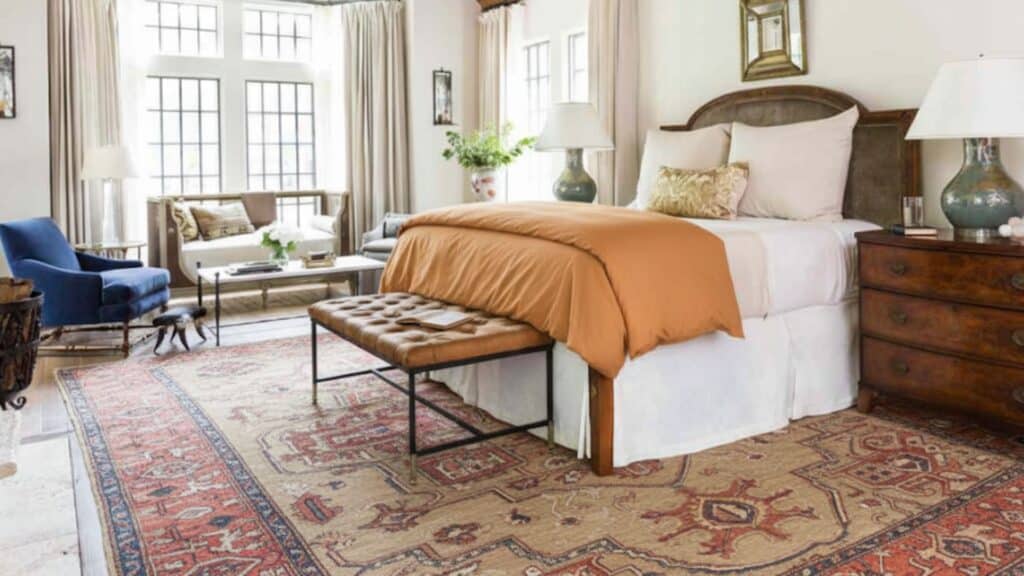 full bed and nightstands on the rug