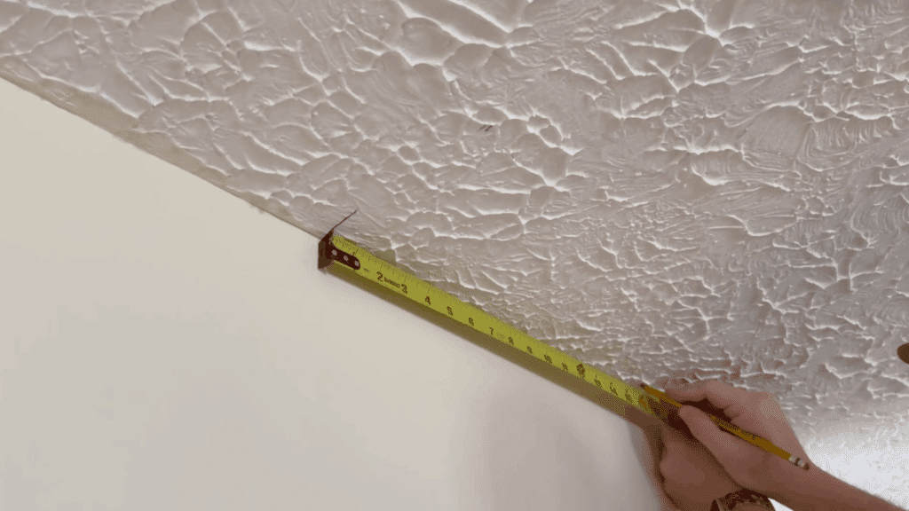 step 1 find And mark your ceiling joists